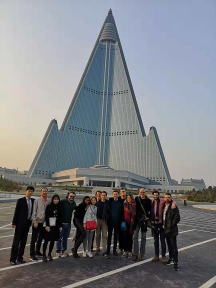 Group photo infront of Ryugyong Hotel