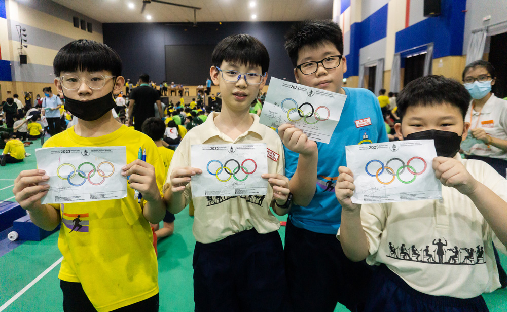 Four pupils with their Olympic Day artwork.