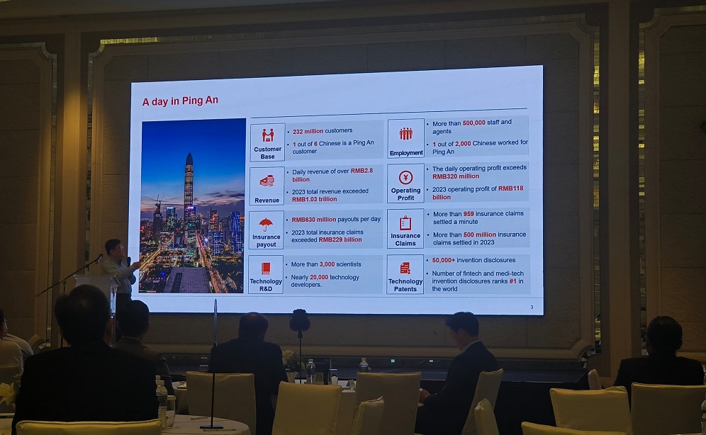 Ping An Group chief scientist Dr Xiao Jing showing the figures related to his company at the ‘AI in Finance – Current Applications and Future Trends’ event on Sept 12, 2024.